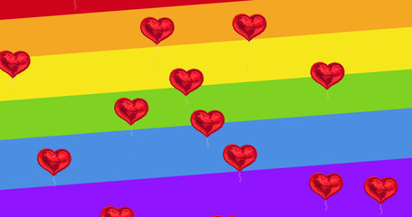 Image of hearts floating on rainbow background