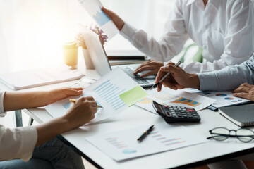 Close-up of business people meeting together to present a new project plan, analysis, marketing...