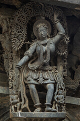 Fototapeta na wymiar The Sculpture of Dancer on the Hoysaleshwara Temple, Hassan, Karnataka, India.