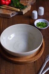 empty bowl and cutlery on the table