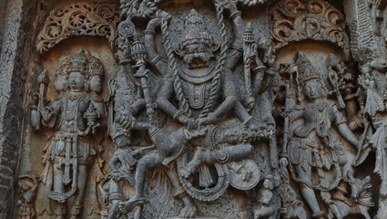 Fototapeta na wymiar The Carving Sculpture of Lord Narshimha on the Hoysaleswara Temple, Halebeedu, Hassan, Karnataka, India.