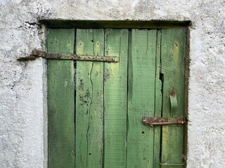 An old green wooden farm door.