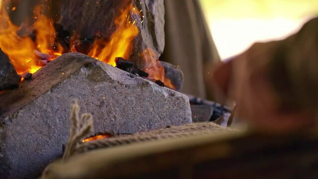 Close up shot old blacksmith furnace and leather bellows blower, Rack focus, Viking Experience