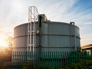 Oil products tall meat storage. Tank for diesel or petrol fuel distribution and import or export by major market players. Essential part of economy. Industrial object.