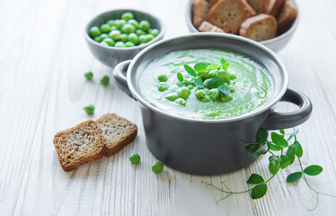 Fresh vegetable soup made of green peas