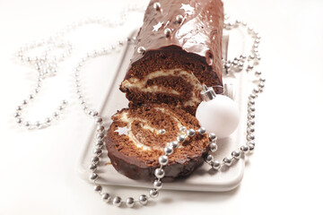 christmas chocolate pastry roll and decoration