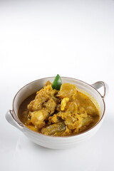 Gulai Tunjang or Kikil or Gulai Kaki Sapi is a popular spicy cow's trotter curry in Padang (West Sumatra-Indonesia) cuisine. Food preparation for the feast of Eid al-Fitr and Eid al-Adha