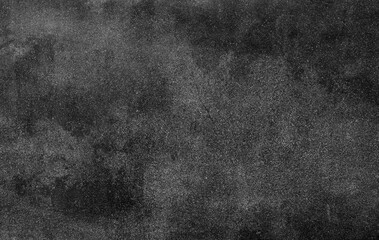 Black rough texture abstract background of cement wall. Black texture background for Halloween day. Concrete wall surface. Closeup concrete material wall. Black wallpaper for death and sad concept.