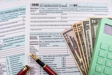 top view of a table with a calendar with the date of filing a citizen's income declaration.
