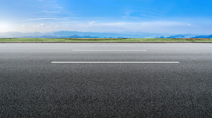 Fototapeta premium Empty road and city buildings background
