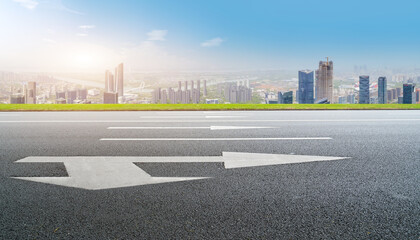 Empty road and city buildings background