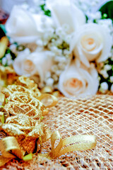 Wedding photo, wedding bouquet beige roses green leaves