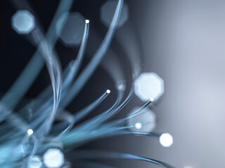Optical fibers against gray background