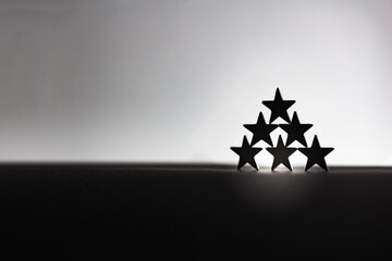 Dream team, all-star concept. A team or group of stars in a pyramid formation. monotone.