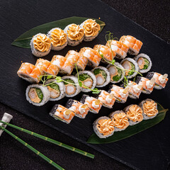 sushi on the black background