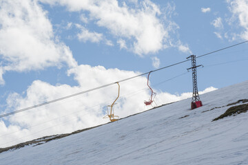 Cable car against the backdrop of the snow-capped Caucasus mountains, glacier seven