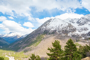 View from Mount Cheget to the snow-capped peaks of the Caucasus