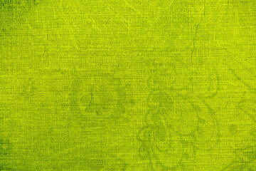 Green background from decorative plaster with abstract spots. Unusual green wall texture with beautiful patterns, creative surface background. Front covering for facing of buildings.