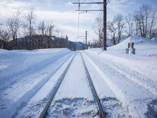 snow-removed railway in winter nagano