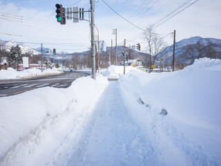 snow-removed side walk in winter nagano