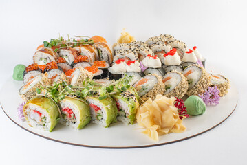 set sushi rolls on white background