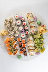 set sushi rolls on white background