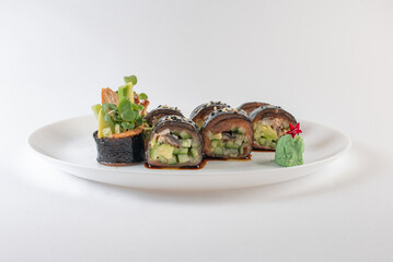 sushi rolls with avocado and salmon