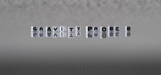 gravity probe b word or concept represented by black and white letter cubes on a grey horizon...