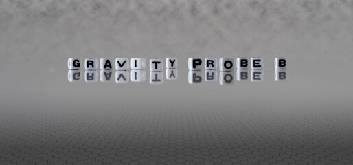 gravity probe b word or concept represented by black and white letter cubes on a grey horizon background stretching to infinity