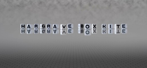 hargrave box kite word or concept represented by black and white letter cubes on a grey horizon...
