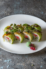green sushi rolls on plate