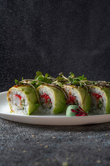 green sushi rolls on plate