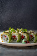 green sushi rolls on plate