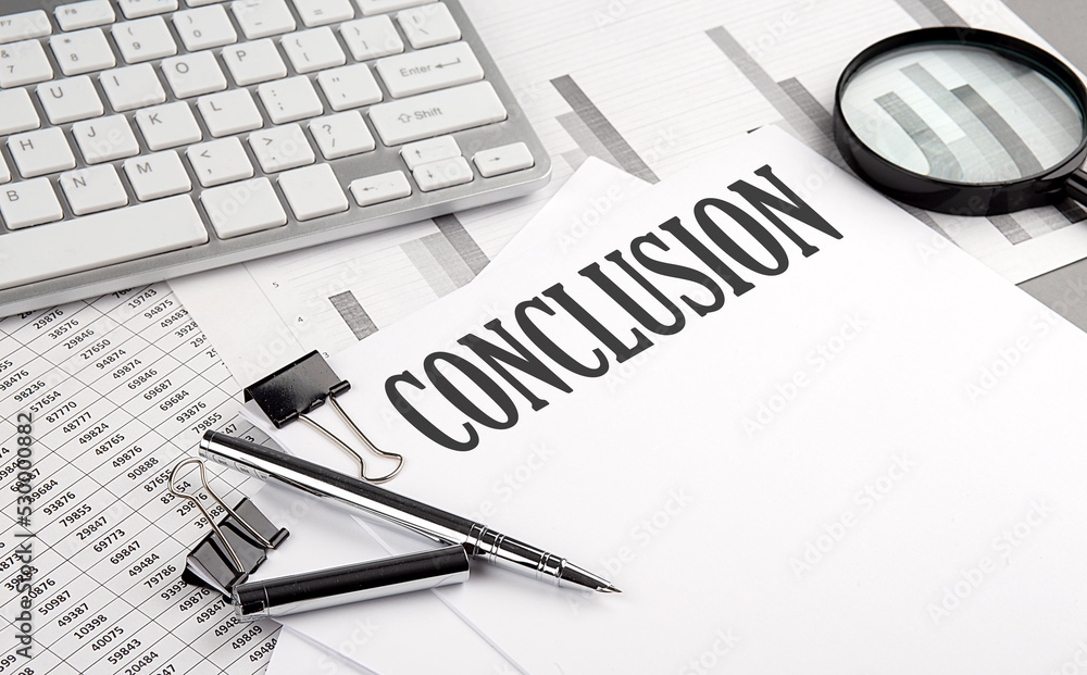 Poster conclusion text on paper with chart and keyboard, business concept