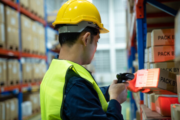 Warehouse worker scan box goods in inventory and check stock product. Transport logistic business...