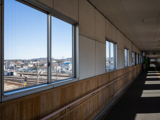 a long empty path of the station and windows
