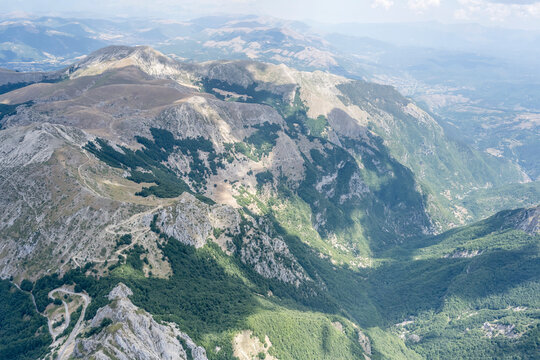 crags of Cambio peak facing  Antrodoco, aerial, Italy