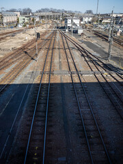 long straight railways under sunny blue sky