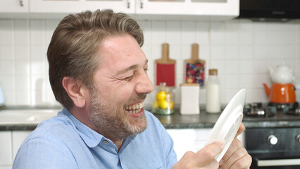 Sweet funny man is the last part of the cake, he is enjoying the food. The young man, very fond of...