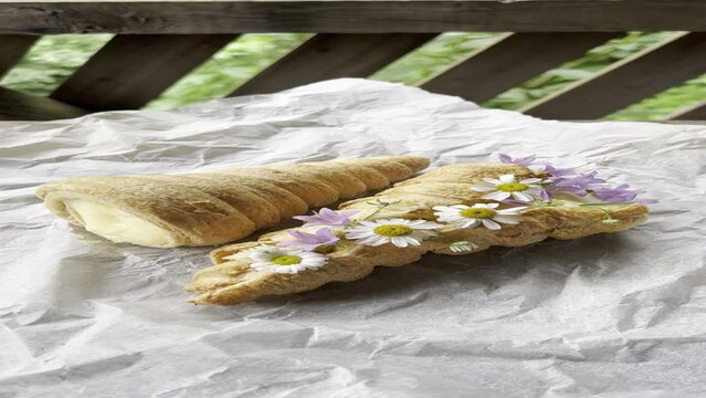 Elegant french cream horn pastries with flowers