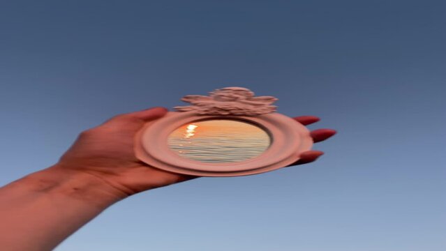 Reflection of the beautiful sunset through the mirror