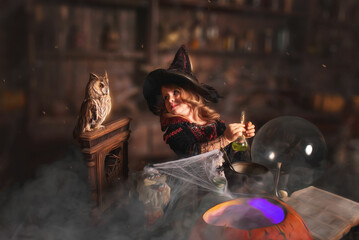 charming melanker witch with an owl prepares a potion in a hatoween costume with a smile