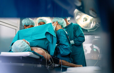 Team of surgeon at work in operating room. Healthcare, hospital concept