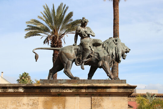 statue of a lion and a mythological character at the massimo theater in palermo in sicily (italy) 