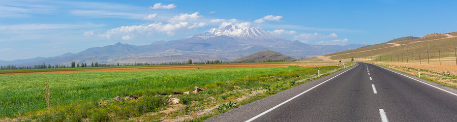 Erciyes Mount with height of 3,864 metres is the highest mountain in Cappadocia and central Anatolia. It is a volcano. - obrazy, fototapety, plakaty