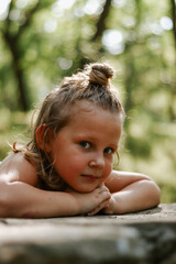 Portrait of a cute girl 5 years old. Close-up portrait of a fair-haired girl.