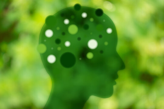 Gedanken im Gehirn gr&uuml;ne Silhouette