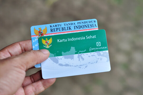 Holds a Healthy Indonesia Card (Health Insurance card from the Government of Indonesia) and Indonesian identity card