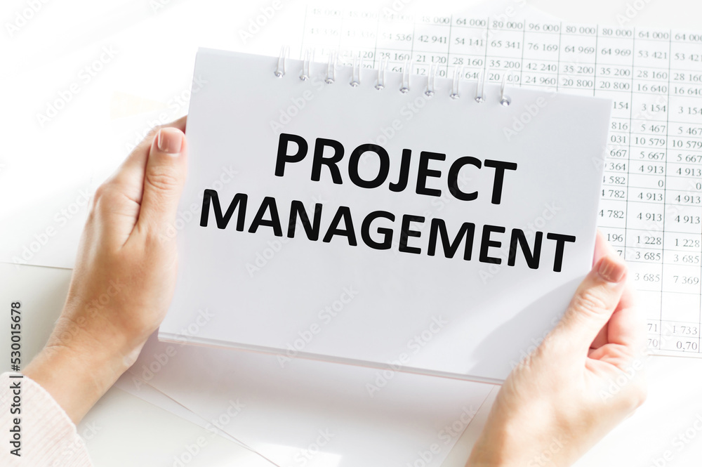Poster notebook with toolls and notes about project management