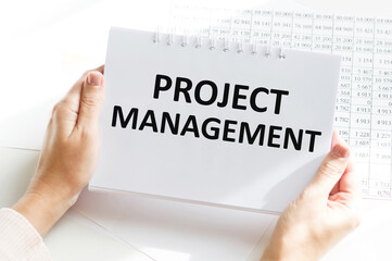 Notebook with Toolls and Notes about Project Management